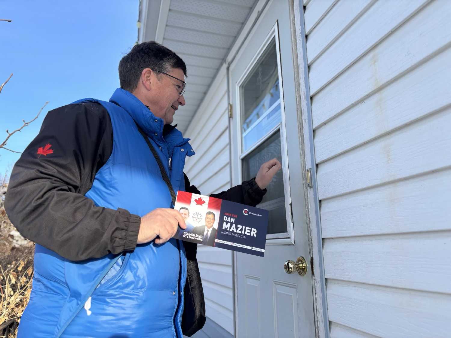 Riding Mountain MP Dan Mazier door knocking during the campaign.