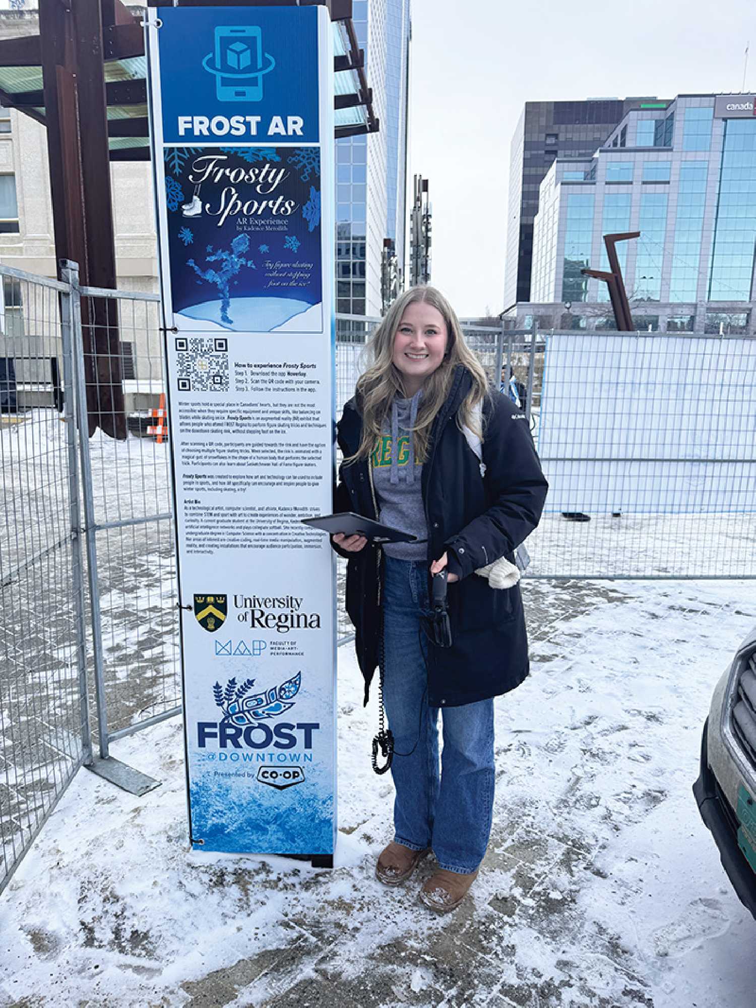 Kadence Meredith at the site of her Frosty Sports installation at Frost Regina in Victoria Park.